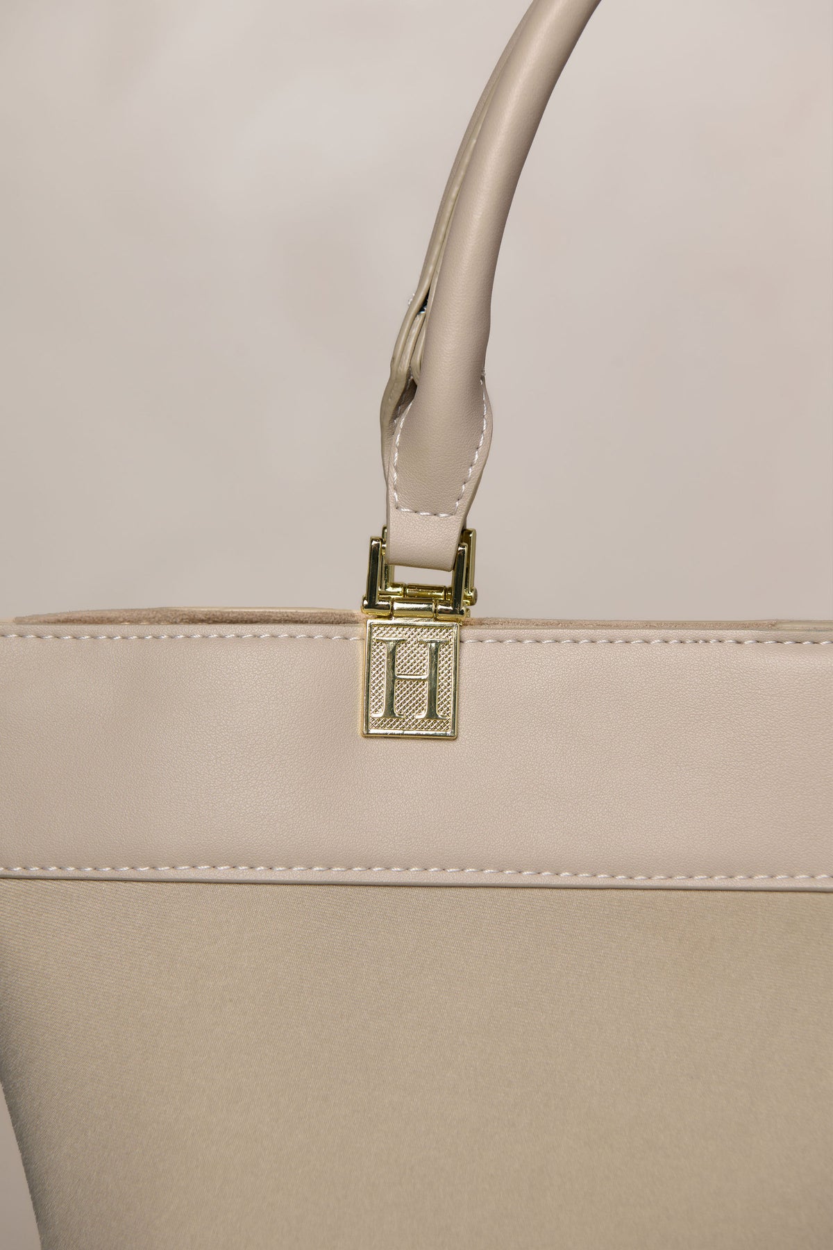 Taupe bag with gold hardware