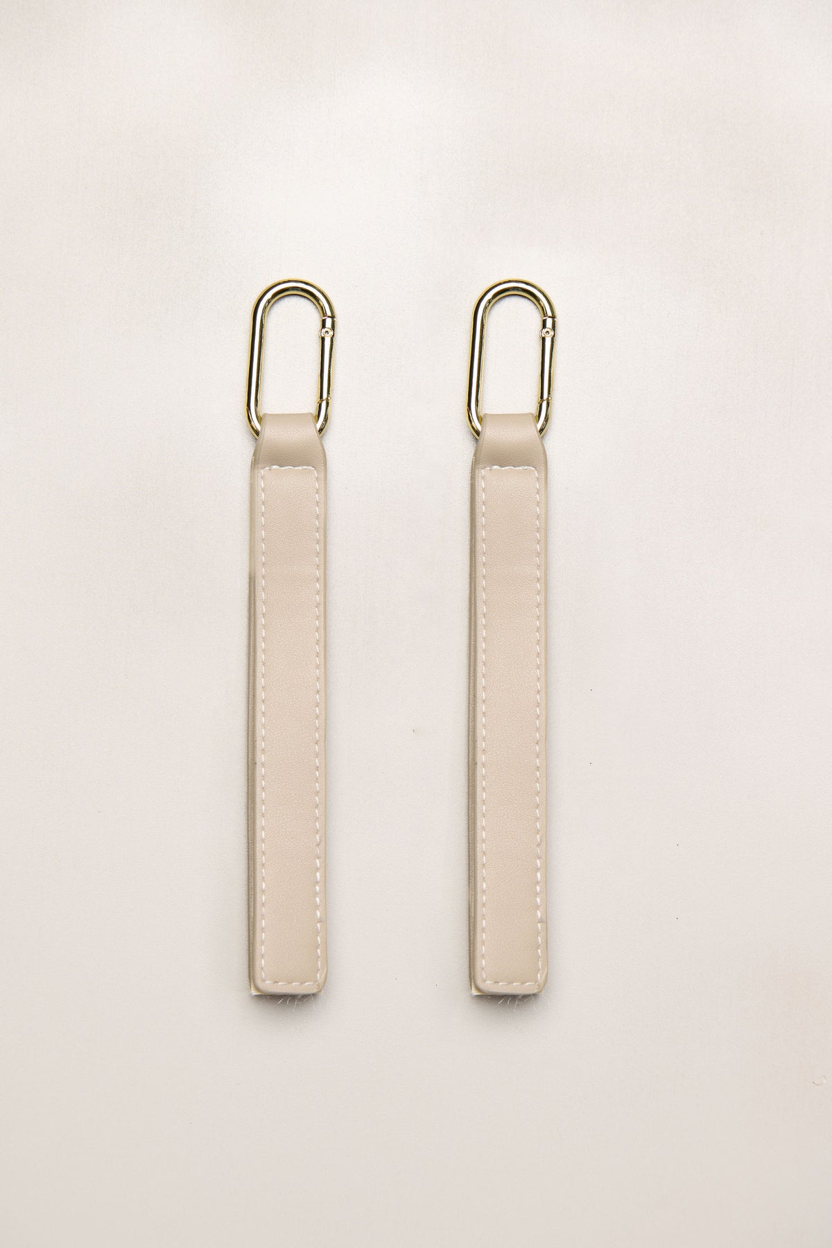 Taupe cream pram straps with gold hardware