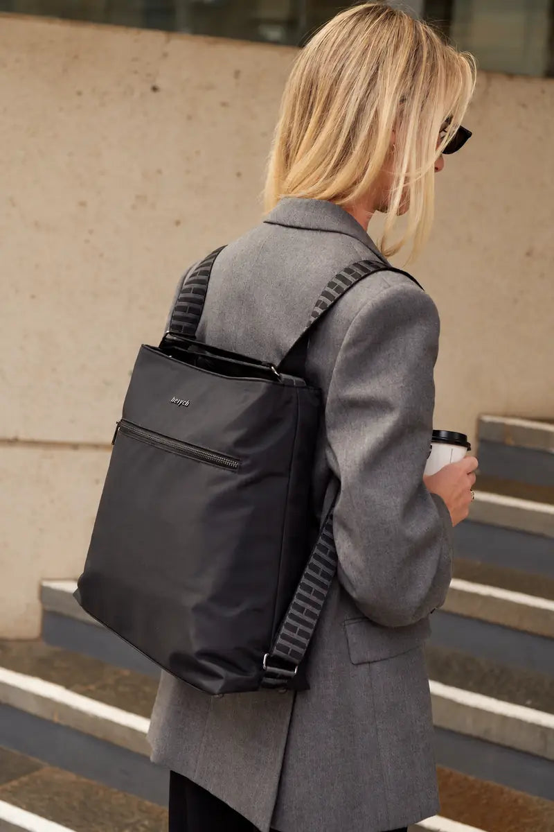 Black H-Convert carried as backpack